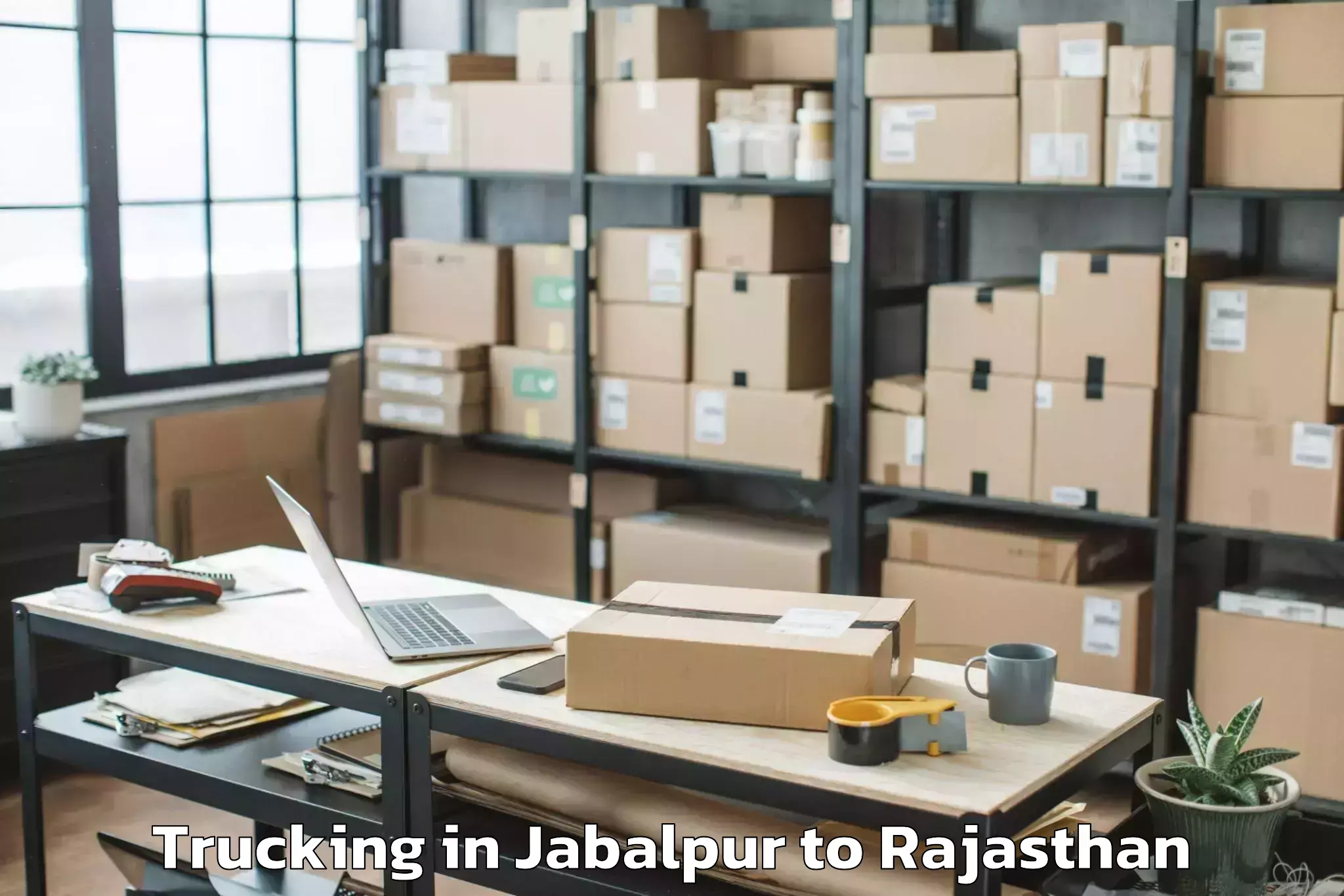 Easy Jabalpur to Madhav University Pindwara Trucking Booking